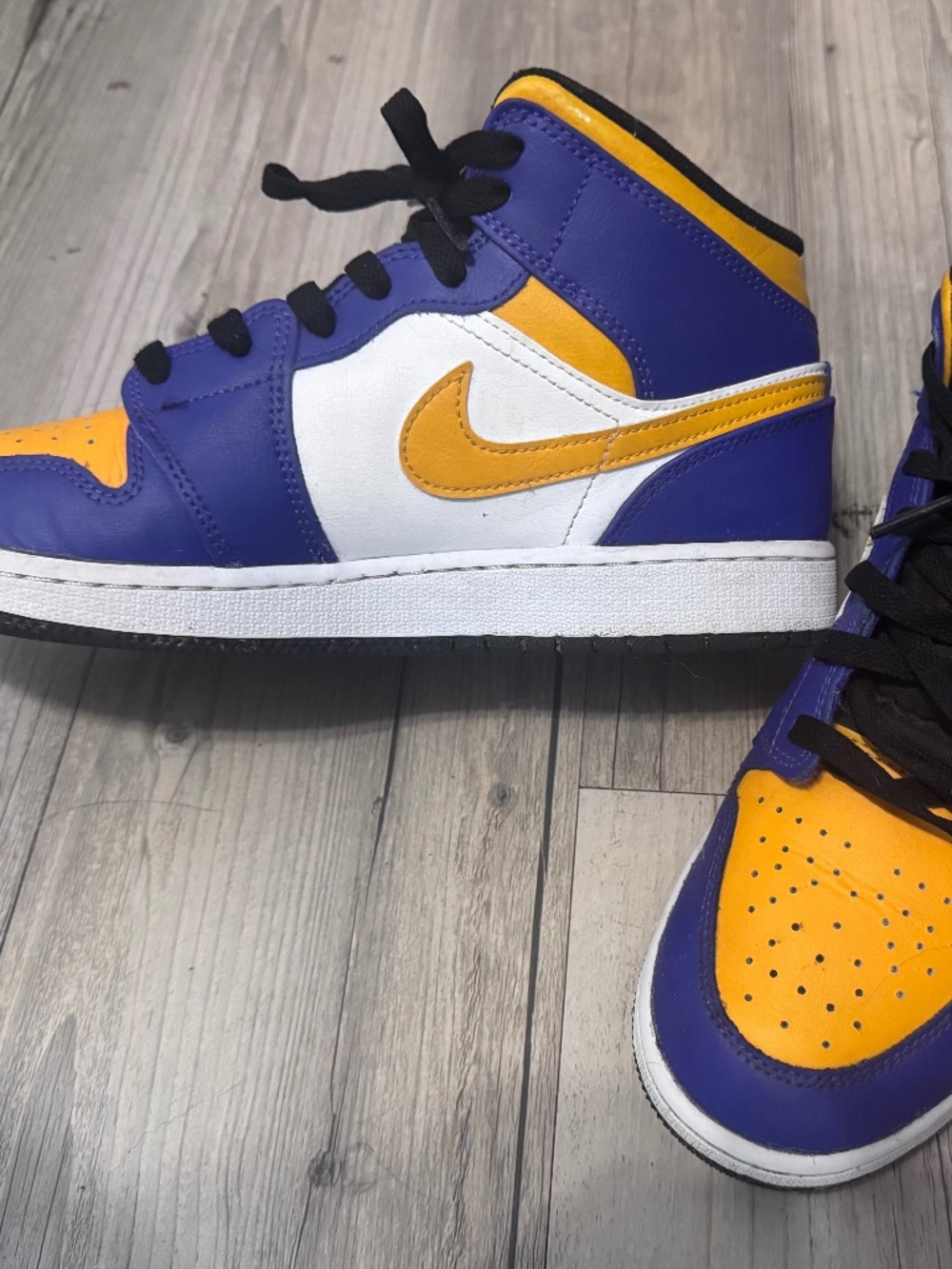 Youth 7 Nike Air Jordan high top sneakers